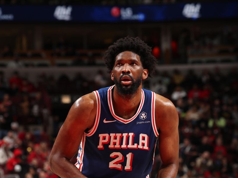 CHICAGO, IL - DECEMBER 8: Joel Embiid #21 of the Philadelphia 76ers shoots a free throw during the game against the Chicago Bulls on December 8, 2024 at United Center in Chicago, Illinois. NOTE TO USER: User expressly acknowledges and agrees that, by downloading and or using this photograph, User is consenting to the terms and conditions of the Getty Images License Agreement. Mandatory Copyright Notice: Copyright 2024 NBAE (Photo by Gary Dineen/NBAE via Getty Images)