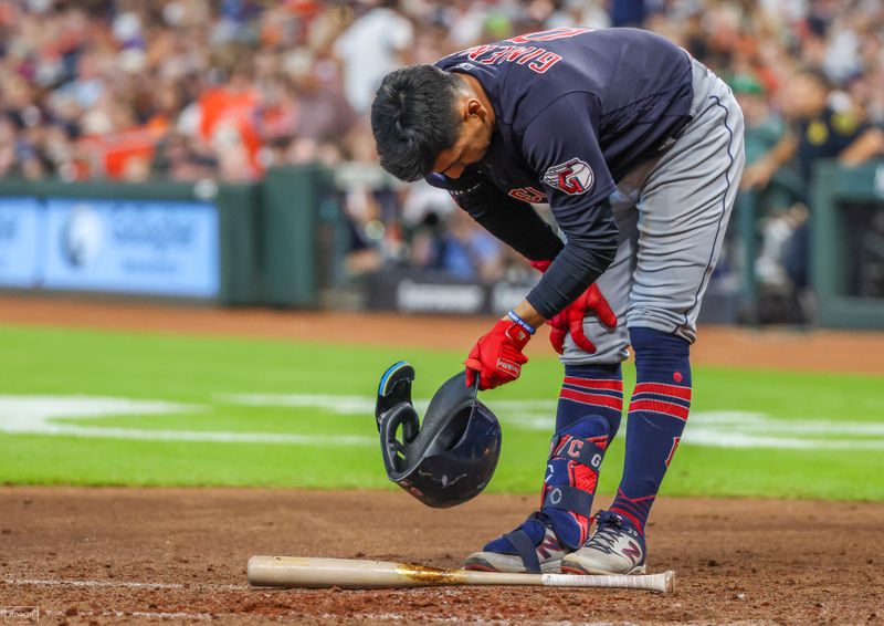 Aug 2, 2023; Houston, Texas, USA; Cleveland Guardians second baseman Andres Gimenez (0) reacts after striking out with the bases loaded to end the top of the second inning against the Houston Astros at Minute Maid Park. Mandatory Credit: Thomas Shea-USA TODAY Sports