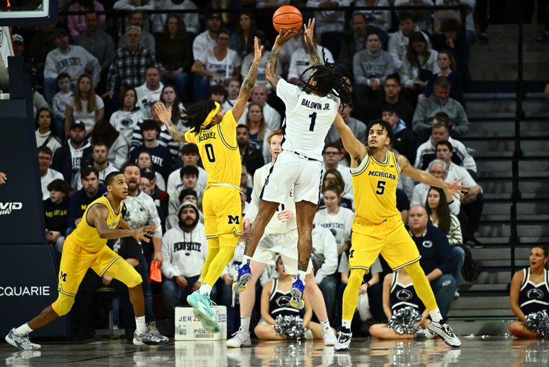 Jan 7, 2024; Philadelphia, Pennsylvania, USA; Penn State Nittany Lions guard Ace Baldwin Jr (1) shoots against Michigan Wolverines guard Dug McDaniel (0) in the second half at The Palestra. Mandatory Credit: Kyle Ross-USA TODAY Sports