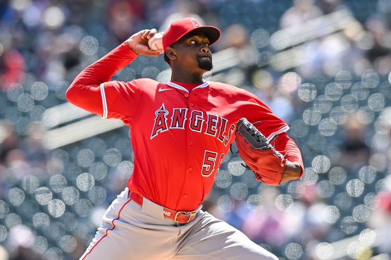 Apr 27, 2025; Minneapolis, Minnesota, USA; Los Angeles Angels pitcher Jose Soriano (59) throws a pitch against the Minnesota Twins during the first inning at Target Field. Mandatory Credit: Jeffrey Becker-Imagn Images