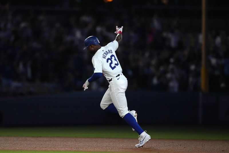Aug 20, 2024; Los Angeles, California, USA; Los Angeles Dodgers right fielder Jason Heyward (23) runs the bases after hitting a three-run home run in the eighth inning against the Seattle Mariners at Dodger Stadium. Mandatory Credit: Kirby Lee-USA TODAY Sports