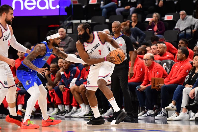 INGLEWOOD, CA - OCTOBER 14: James Harden #1 of the LA Clippers handles the ball during the game against the Dallas Mavericks during a NBA Preseason game on October 14, 2024 at the Intuit Dome in Inglewood, California. NOTE TO USER: User expressly acknowledges and agrees that, by downloading and/or using this Photograph, user is consenting to the terms and conditions of the Getty Images License Agreement. Mandatory Copyright Notice: Copyright 2024 NBAE (Photo by Adam Pantozzi/NBAE via Getty Images)