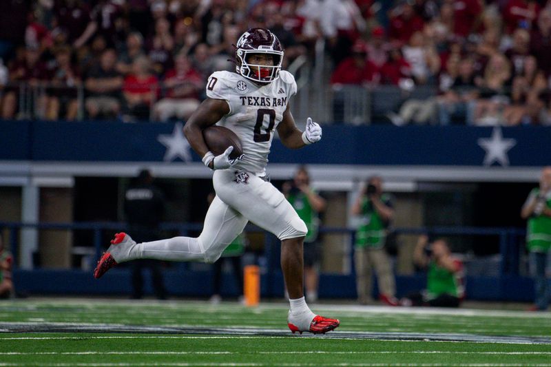 Sep 30, 2023; Arlington, Texas, USA; Texas A&M Aggies wide receiver Evan Stewart (1) returns a punt for a touchdown against the Arkansas Razorbacks during the second half at AT&T Stadium. Mandatory Credit: Jerome Miron-USA TODAY Sports