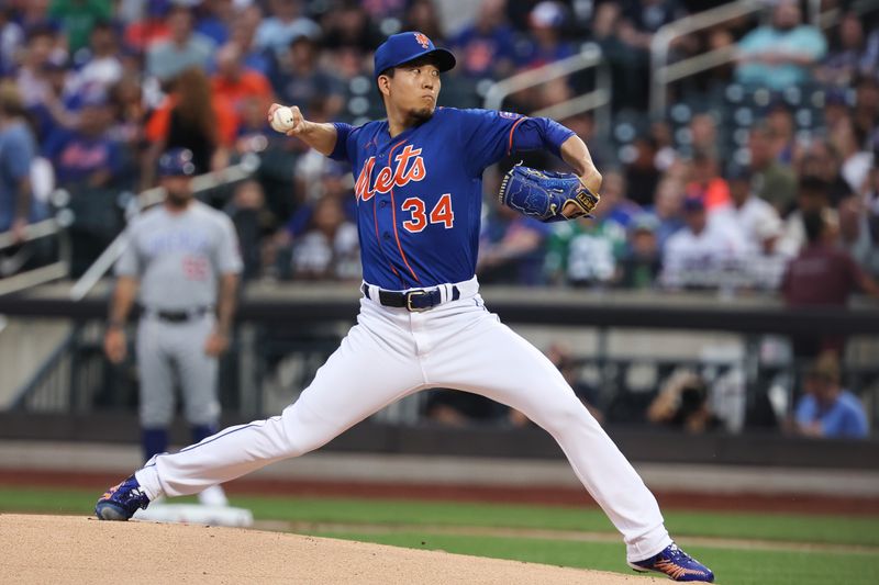 Aug 7, 2023; New York City, New York, USA; New York Mets starting pitcher Kodai Senga (34) delivers a pitch during the first inning against the Chicago Cubs at Citi Field. Mandatory Credit: Vincent Carchietta-USA TODAY Sports