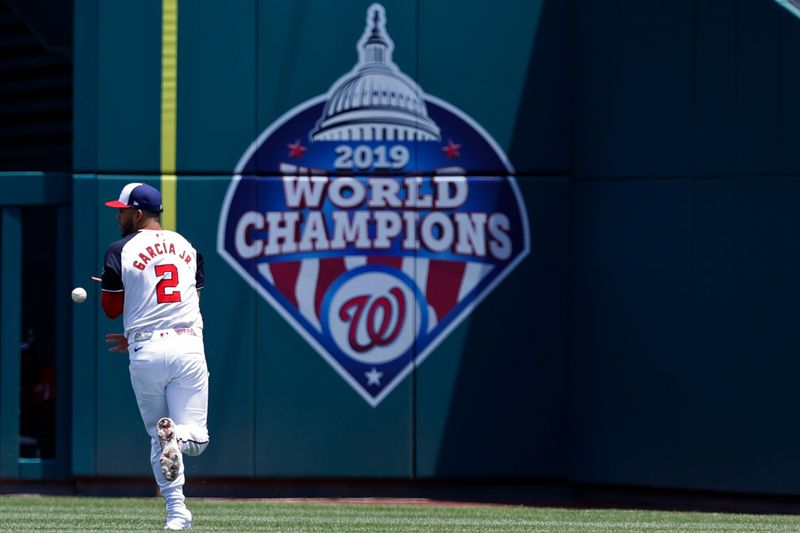 Jun 20, 2024; Washington, District of Columbia, USA; Washington Nationals second baseman Luis García Jr. (2) attempts to catch a pop up by Arizona Diamondbacks first baseman Christian Walker (not pictured) during the third inning at Nationals Park. Mandatory Credit: Geoff Burke-USA TODAY Sports