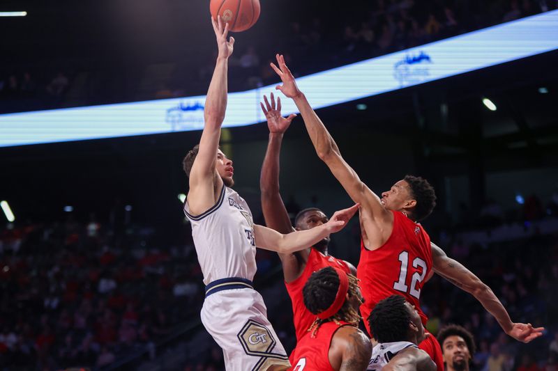 Feb 25, 2023; Atlanta, Georgia, USA; Georgia Tech Yellow Jackets guard Lance Terry (0) shoots over Louisville Cardinals forward JJ Traynor (12) in the second half at McCamish Pavilion. Mandatory Credit: Brett Davis-USA TODAY Sports