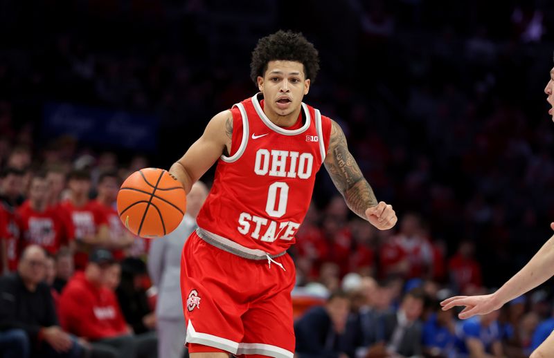 Jan 17, 2026; Columbus, Ohio, USA;  Ohio State Buckeyes guard John Mobley Jr. (0) controls the ball during the second half against the UCLA Bruins at Value City Arena. Mandatory Credit: Joseph Maiorana-Imagn Images
