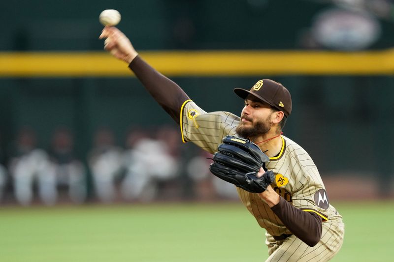 May 3, 2024; Phoenix, Arizona, USA; San Diego Padres pitcher Dylan Cease (84) pitches against the Arizona Diamondbacks during the first inning at Chase Field. Mandatory Credit: Joe Camporeale-USA TODAY Sports