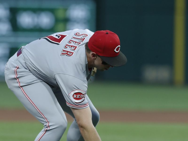 Aug 11, 2023; Pittsburgh, Pennsylvania, USA; Cincinnati Reds third baseman Spencer Steer (7) attempts to bare hand a ball hit by Pittsburgh Pirates left fielder Bryan Reynolds (not pictured) which resulted in a hit during the fourth inning at PNC Park. Mandatory Credit: Charles LeClaire-USA TODAY Sports