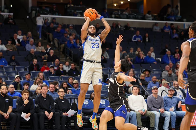 Dec 3, 2025; Memphis, Tennessee, USA; New Orleans Privateers forward MJ Thomas (23) shoots the ball against New Orleans Privateers guard Irish Coquia (3) during the first half at FedExForum. Mandatory Credit: Wesley Hale-Imagn Images