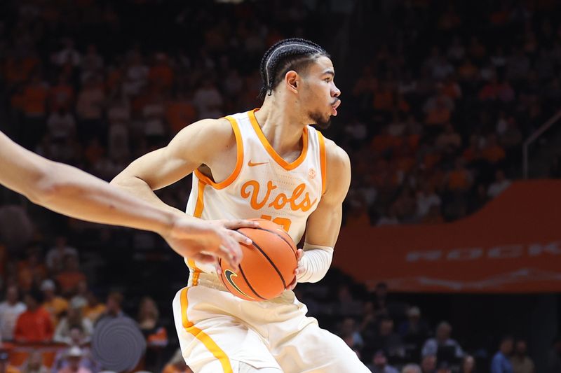 Feb 28, 2023; Knoxville, Tennessee, USA; Tennessee Volunteers forward Olivier Nkamhoua (13) looks to move the ball against the Arkansas Razorbacks during the second half at Thompson-Boling Arena. Mandatory Credit: Randy Sartin-USA TODAY Sports