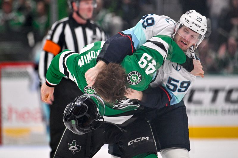 Feb 25, 2026; Dallas, Texas, USA;  Dallas Stars center Justin Hryckowian (49) fights with Seattle Kraken center Ben Meyers (59) during the third period at the American Airlines Center. Mandatory Credit: Jerome Miron-Imagn Images