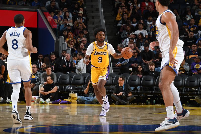 SAN FRANCISCO, CA - OCTOBER 18: Bronny James #9 of the Los Angeles Lakers dribbles the ball during the game against the Golden State Warriors during a NBA Preseason game on October 18, 2024 at Chase Center in San Francisco, California. NOTE TO USER: User expressly acknowledges and agrees that, by downloading and or using this photograph, user is consenting to the terms and conditions of Getty Images License Agreement. Mandatory Copyright Notice: Copyright 2024 NBAE (Photo by Noah Graham/NBAE via Getty Images)