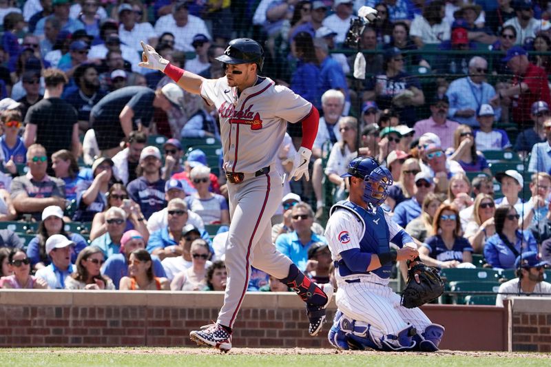 May 23, 2024; Chicago, Illinois, USA; Atlanta Braves outfielder Jarred Kelenic (24) gestures after hitting a home run against the Chicago Cubs during the fifth inning at Wrigley Field. Mandatory Credit: David Banks-USA TODAY Sports