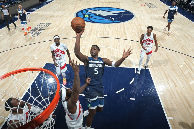 MINNEAPOLIS, MN -  OCTOBER 26: Anthony Edwards #5 of the Minnesota Timberwolves shoots the ball during the game against the Toronto Raptors on October 26, 2024 at Target Center in Minneapolis, Minnesota. NOTE TO USER: User expressly acknowledges and agrees that, by downloading and or using this Photograph, user is consenting to the terms and conditions of the Getty Images License Agreement. Mandatory Copyright Notice: Copyright 2024 NBAE (Photo by David Sherman/NBAE via Getty Images)