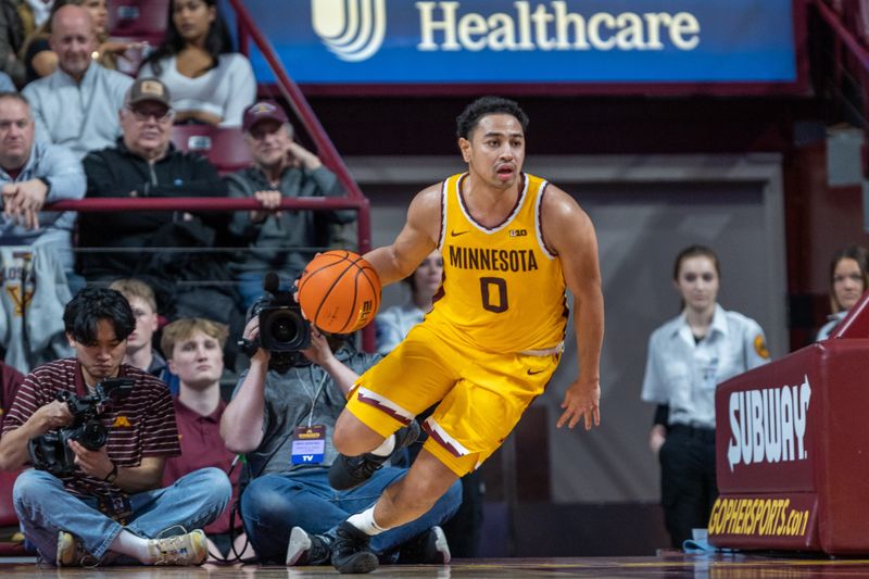 Jan 19, 2023; Minneapolis, Minnesota, USA; Minnesota Golden Gophers guard Taurus Samuels (0) dribbles the ball in the first half against the Purdue Boilermakers at Williams Arena. Mandatory Credit: Matt Blewett-USA TODAY Sports