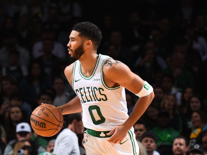 BOSTON, MA - OCTOBER 12: Jayson Tatum #0 of the Boston Celtics dribbles the ball during the game against the Philadelphia 76ers during a NBA Preseason game on October 12, 2024 at TD Garden in Boston, Massachusetts. NOTE TO USER: User expressly acknowledges and agrees that, by downloading and/or using this Photograph, user is consenting to the terms and conditions of the Getty Images License Agreement. Mandatory Copyright Notice: Copyright 2024 NBAE (Photo by Brian Babineau/NBAE via Getty Images)