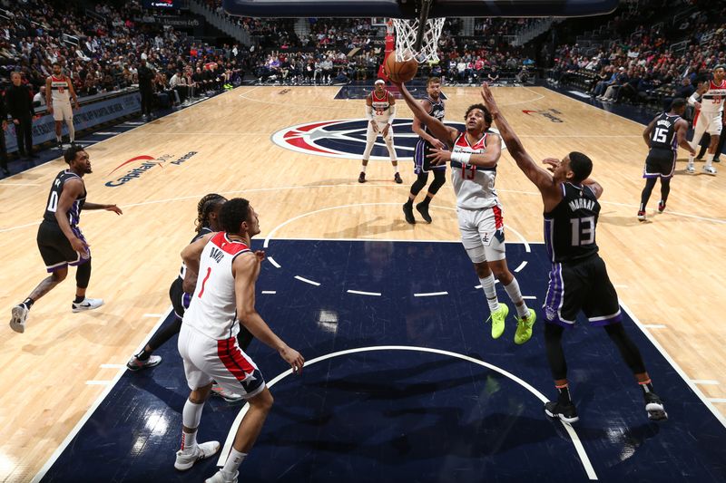 WASHINGTON, DC -? MARCH 21:  Jordan Poole #13 of the Washington Wizards goes to the basket during the game on March 21, 2024 at Capital One Arena in Washington, DC. NOTE TO USER: User expressly acknowledges and agrees that, by downloading and or using this Photograph, user is consenting to the terms and conditions of the Getty Images License Agreement. Mandatory Copyright Notice: Copyright 2024 NBAE (Photo by Kenny Giarla/NBAE via Getty Images)