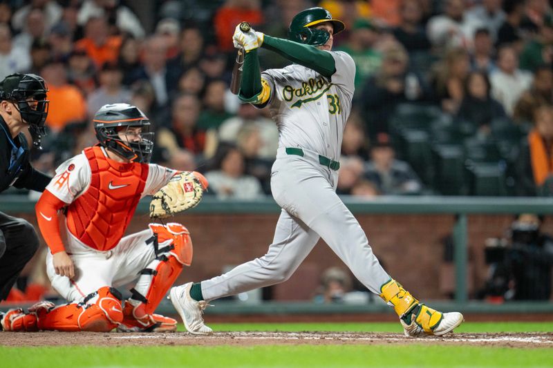 Jul 30, 2024; San Francisco, California, USA;  Oakland Athletics outfielder JJ Bleday (33) hits a home run during the eighth inning against the San Francisco Giants at Oracle Park. Mandatory Credit: Neville E. Guard-USA TODAY Sports