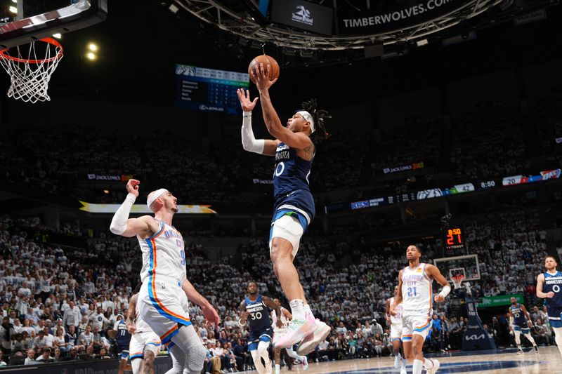 MINNEAPOLIS, MN -  MAY 24: Terrence Shannon Jr. #00 of the Minnesota Timberwolves drives to the basket during the game against the Oklahoma City Thunder during Game 3 of the 2025 NBA Western Conference Finals on May 24, 2025 at Target Center in Minneapolis, Minnesota. NOTE TO USER: User expressly acknowledges and agrees that, by downloading and or using this Photograph, user is consenting to the terms and conditions of the Getty Images License Agreement. Mandatory Copyright Notice: Copyright 2025 NBAE (Photo by Jesse D. Garrabrant/NBAE via Getty Images)