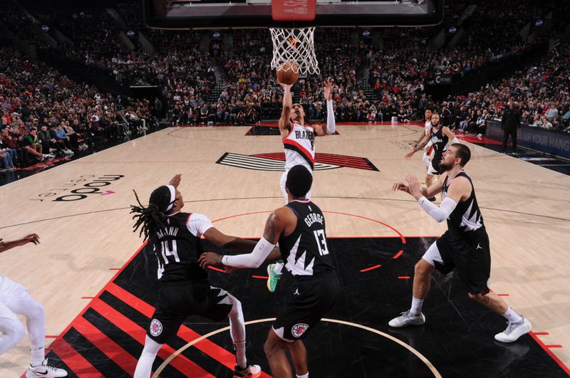 PORTLAND, OR - MARCH 22:  Dalano Banton #5 of the Portland Trail Blazers shoots the ball during the game  on March 22, 2024 at the Moda Center Arena in Portland, Oregon. NOTE TO USER: User expressly acknowledges and agrees that, by downloading and or using this photograph, user is consenting to the terms and conditions of the Getty Images License Agreement. Mandatory Copyright Notice: Copyright 2024 NBAE (Photo by Cameron Browne/NBAE via Getty Images)