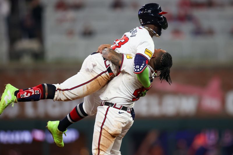 Apr 24, 2024; Atlanta, Georgia, USA; Atlanta Braves center fielder Michael Harris II (23) celebrates after a walk-off double with catcher Chadwick Tromp (45) against the Miami Marlins in the tenth inning at Truist Park. Mandatory Credit: Brett Davis-USA TODAY Sports
