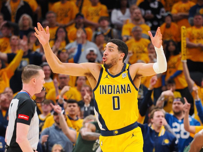 INDIANAPOLIS, IN - APRIL 26:  Tyrese Haliburton #0 of the Indiana Pacers reacts against the Milwaukee Bucks during Round 1 Game 3 of the 2024 NBA Playoffs on April 26, 2024 at Gainbridge Fieldhouse in Indianapolis, Indiana. NOTE TO USER: User expressly acknowledges and agrees that, by downloading and or using this Photograph, user is consenting to the terms and conditions of the Getty Images License Agreement. Mandatory Copyright Notice: Copyright 2024 NBAE (Photo by Ron Hoskins/NBAE via Getty Images)