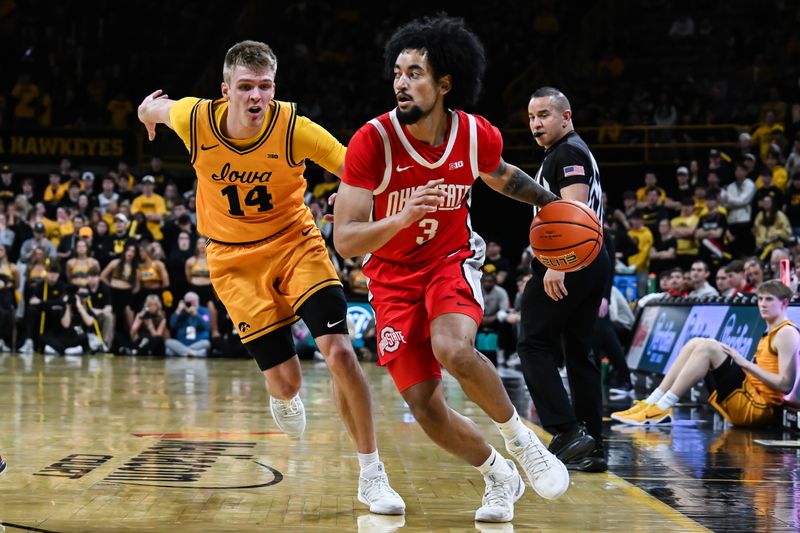 Feb 25, 2026; Iowa City, Iowa, USA; Ohio State Buckeyes guard Taison Chatman (3) controls the ball as Iowa Hawkeyes guard Bennett Stirtz (14) defends during the first half at Carver-Hawkeye Arena. Mandatory Credit: Jeffrey Becker-Imagn Images Feb 25, 2026; Iowa City, Iowa, USA; Ohio State Buckeyes guard Taison Chatman (3) controls the ball as Iowa Hawkeyes guard Bennett Stirtz (14) defends during the first half at Carver-Hawkeye Arena. Mandatory Credit: Jeffrey Becker-Imagn Images