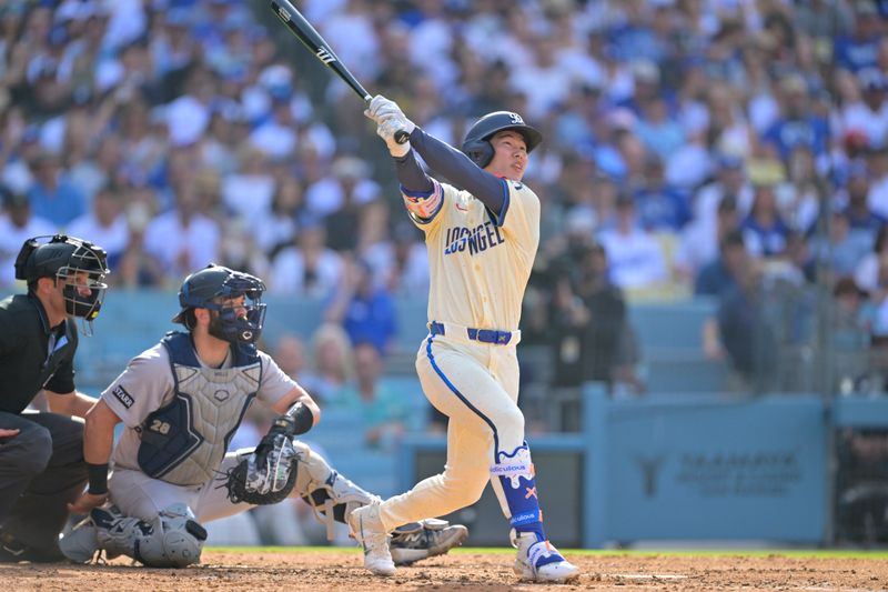 May 31, 2025; Los Angeles, California, USA; Los Angeles Dodgers second baseman Hyeseong Kim (6) hits a home run in the second inning against the New York Yankees at Dodger Stadium. Mandatory Credit: Jayne Kamin-Oncea-Imagn Images