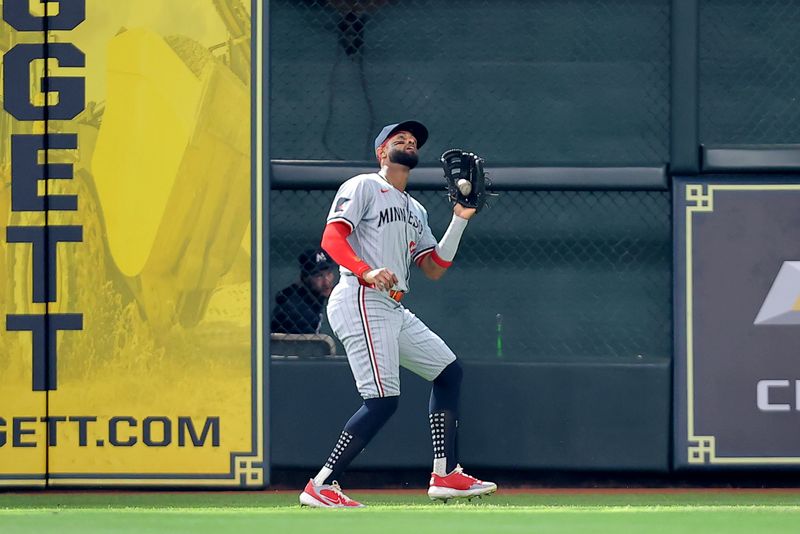 Jun 1, 2024; Houston, Texas, USA; Minnesota Twins left fielder Willi Castro (50) catches a fly ball for an out against the Houston Astros during the fourth inning at Minute Maid Park. Mandatory Credit: Erik Williams-USA TODAY Sports