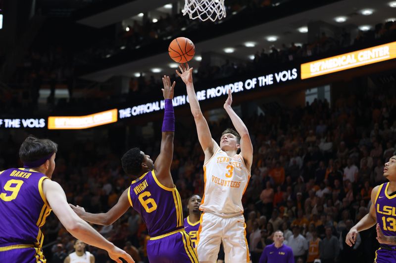 Feb 7, 2024; Knoxville, Tennessee, USA; Tennessee Volunteers guard Dalton Knecht (3) shoots the ball against LSU Tigers guard Jordan Wright (6) during the first half at Thompson-Boling Arena at Food City Center. Mandatory Credit: Randy Sartin-USA TODAY Sports