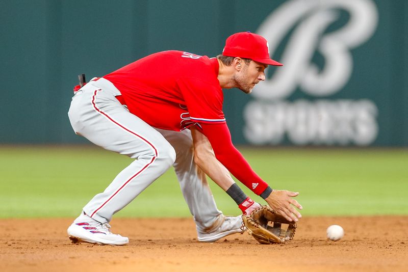 Apr 2, 2023; Arlington, Texas, USA; Philadelphia Phillies shortstop Trea Turner (7) fields a ground ball during the second inning against the Texas Rangers at Globe Life Field. Mandatory Credit: Andrew Dieb-USA TODAY Sports