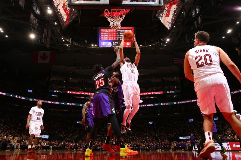 TORONTO, CANADA - OCTOBER 23: Jarrett Allen #31 of the Cleveland Cavaliers drives to the basket during the game against the Toronto Raptors on October 23, 2024 at the Scotiabank Arena in Toronto, Ontario, Canada.  NOTE TO USER: User expressly acknowledges and agrees that, by downloading and or using this Photograph, user is consenting to the terms and conditions of the Getty Images License Agreement.  Mandatory Copyright Notice: Copyright 2024 NBAE (Photo by Vaughn Ridley/NBAE via Getty Images)