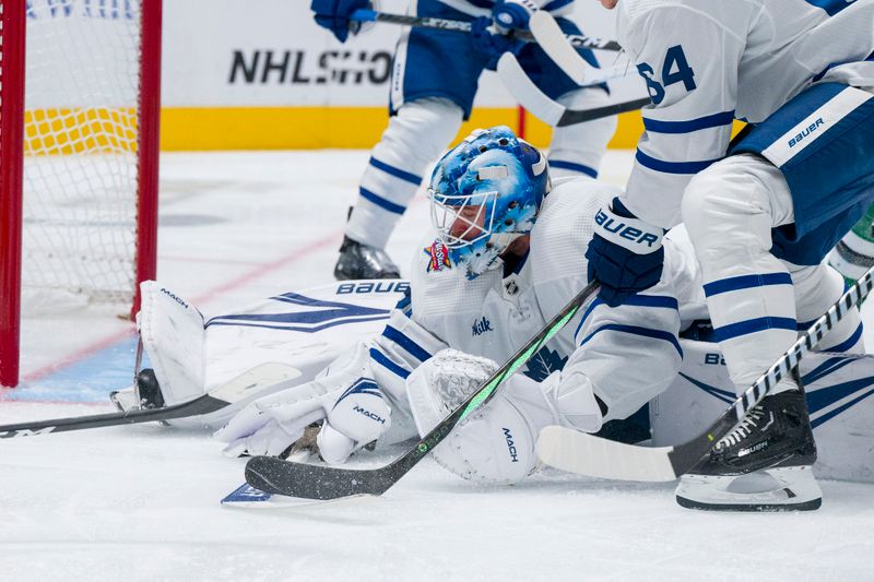 Oct 26, 2023; Dallas, Texas, USA; Toronto Maple Leafs goaltender Joseph Woll (60) makes a pad save on a \Dallas Stars shot during the second period at the American Airlines Center. Mandatory Credit: Jerome Miron-USA TODAY Sports