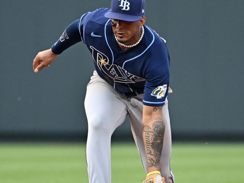 Jul 15, 2023; Kansas City, Missouri, USA;  Tampa Bay Rays shortstop Wander Franco (5) fields a ground ball in the third inning against the Kansas City Royals at Kauffman Stadium. Mandatory Credit: Peter Aiken-USA TODAY Sports