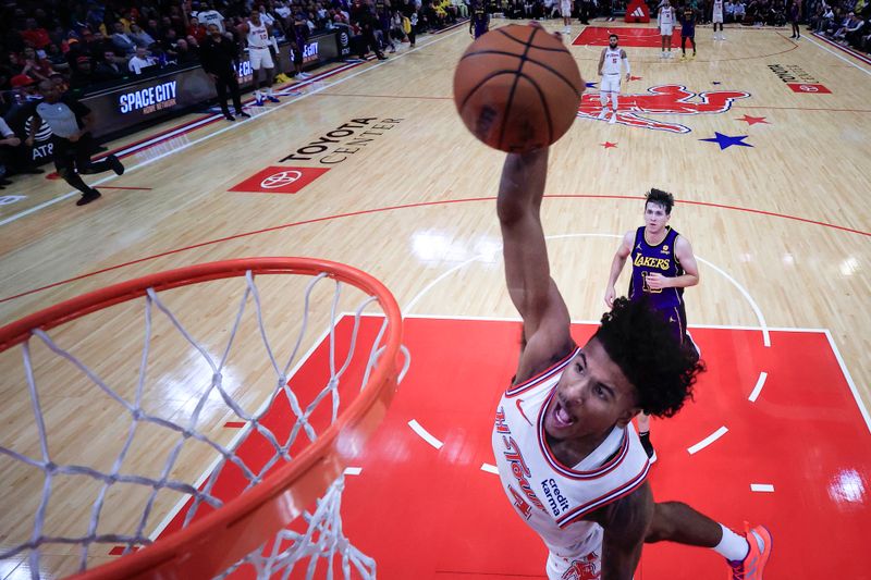 HOUSTON, TEXAS - NOVEMBER 08: Jalen Green #4 of the Houston Rockets dunks the ball against the Los Angeles Lakers during the first half at Toyota Center on November 08, 2023 in Houston, Texas. NOTE TO USER: User expressly acknowledges and agrees that, by downloading and or using this photograph, User is consenting to the terms and conditions of the Getty Images License Agreement.? (Photo by Carmen Mandato/Getty Images)