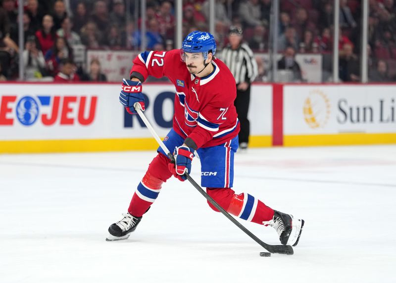 Dec 9, 2025; Montreal, Quebec, CAN; Montreal Canadiens defenseman Arber Xhekaj (72) takes a shot during the second period of the game against the Tampa Bay Lightning at the Bell Centre. Mandatory Credit: Eric Bolte-Imagn Images