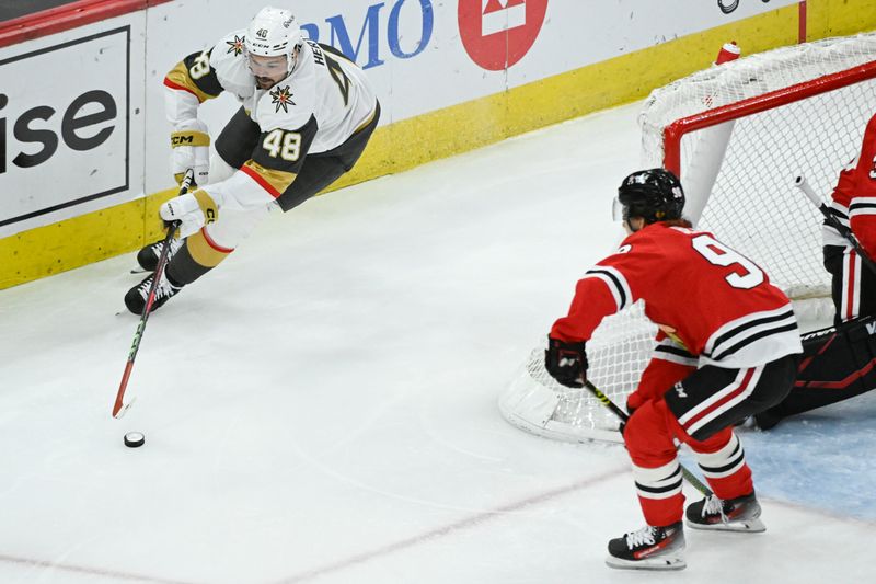 Jan 18, 2025; Chicago, Illinois, USA;  Vegas Golden Knights center Tomas Hertl (48) moves the puck against Chicago Blackhawks center Connor Bedard (98) during the second period at United Center. Mandatory Credit: Matt Marton-Imagn Images