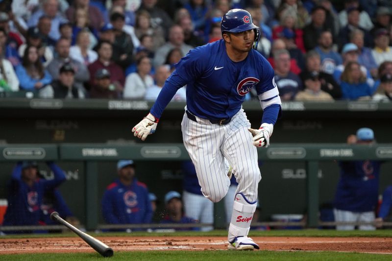 Mar 6, 2025; Mesa, Arizona, USA; Chicago Cubs outfielder Seiya Suzuki (27) hits against the Kansas City Royals in the first inning at Sloan Park. Mandatory Credit: Rick Scuteri-Imagn Images