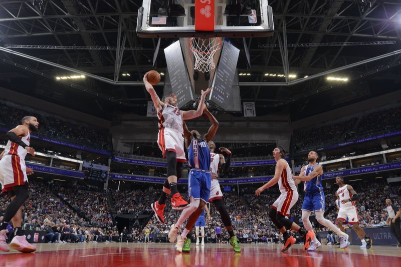 SACRAMENTO, CA - FEBRUARY 26: Kevin Love #42 of the Miami Heat grabs a rebound during the game against the Sacramento Kings on February 26, 2024 at Golden 1 Center in Sacramento, California. NOTE TO USER: User expressly acknowledges and agrees that, by downloading and or using this Photograph, user is consenting to the terms and conditions of the Getty Images License Agreement. Mandatory Copyright Notice: Copyright 2024 NBAE (Photo by Rocky Widner/NBAE via Getty Images)