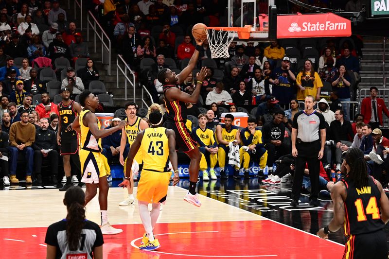 ATLANTA, GA - MARCH 6: Clint Capela #15 of the Atlanta Hawks drives to the basket during the game against the Indiana Pacers on March 6, 2025 at State Farm Arena in Atlanta, Georgia.  NOTE TO USER: User expressly acknowledges and agrees that, by downloading and/or using this Photograph, user is consenting to the terms and conditions of the Getty Images License Agreement. Mandatory Copyright Notice: Copyright 2025 NBAE (Photo by Adam Hagy/NBAE via Getty Images)