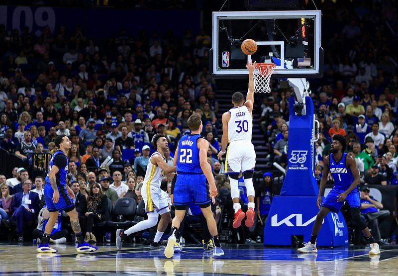 ORLANDO, FLORIDA - MARCH 27: Stephen Curry #30 of the Golden State Warriors shoots during a game against the Orlando Magic at Kia Center on March 27, 2024 in Orlando, Florida. NOTE TO USER: User expressly acknowledges and agrees that, by downloading and or using this photograph, User is consenting to the terms and conditions of the Getty Images License Agreement. (Photo by Mike Ehrmann/Getty Images)