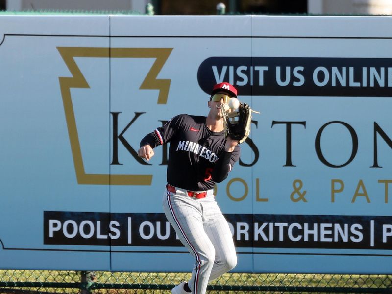 Mar 14, 2025; Sarasota, Florida, USA;  Minnesota Twins outfielder Armando Alvarez (56) catches a fly ball during the first inning against the Baltimore Orioles at Ed Smith Stadium. Mandatory Credit: Kim Klement Neitzel-Imagn Images