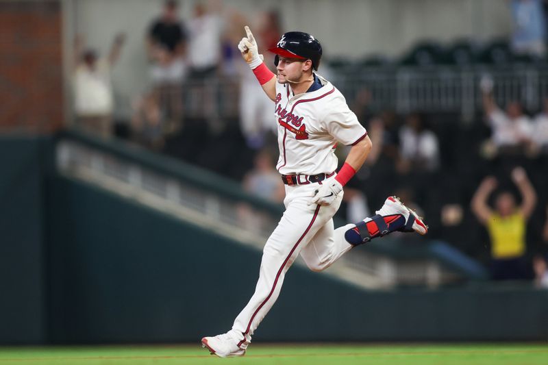 Aug 7, 2024; Atlanta, Georgia, USA; Atlanta Braves center fielder Jarred Kelenic (24) hits a home run against the Milwaukee Brewers in the ninth inning at Truist Park. Mandatory Credit: Brett Davis-USA TODAY Sports
