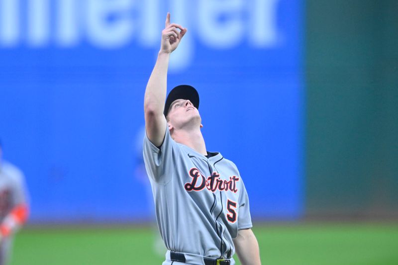 Sep 25, 2025; Cleveland, Ohio, USA; Detroit Tigers starting pitcher Troy Melton (52) point at a fly ball in the first inning against the Cleveland Guardians at Progressive Field. Mandatory Credit: David Richard-Imagn Images