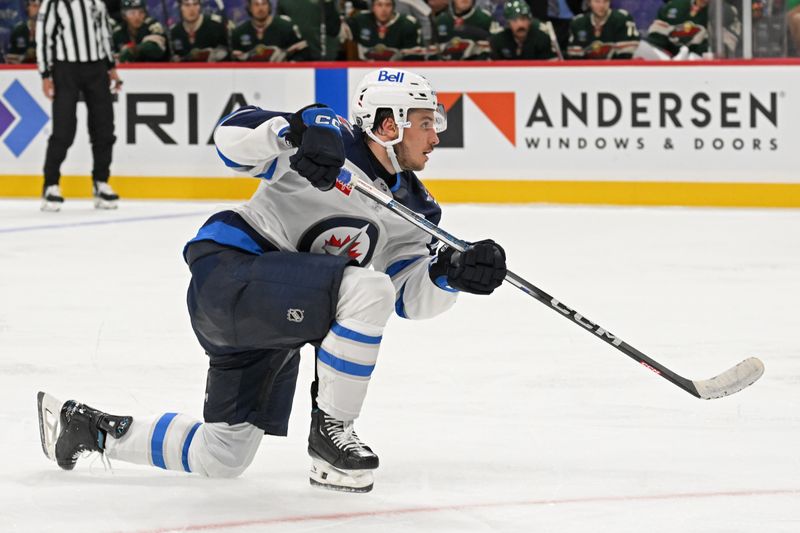 Sep 27, 2024; Saint Paul, Minnesota, USA;  Winnipeg Jets forward Nikita Chibrikov (90) takes a shot on goal against the Minnesota Wild during the third period at Xcel Energy Center. Mandatory Credit: Nick Wosika-Imagn Images

