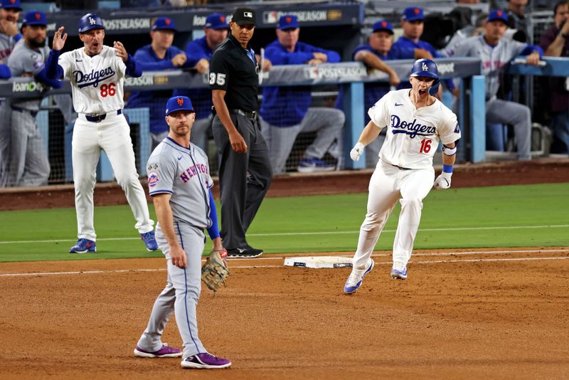 Oct 20, 2024; Los Angeles, California, USA; Los Angeles Dodgers catcher Will Smith (16) celebrates after hitting a two run home run during the third inning against the New York Mets during game six of the NLCS for the 2024 MLB playoffs at Dodger Stadium. Mandatory Credit: Jason Parkhurst-Imagn Images
