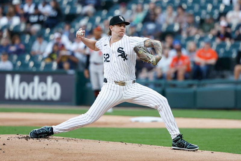 May 23, 2024; Chicago, Illinois, USA; Chicago White Sox starting pitcher Mike Clevinger (52) delivers a pitch against the Baltimore Orioles during the first inning at Guaranteed Rate Field. Mandatory Credit: Kamil Krzaczynski-USA TODAY Sports