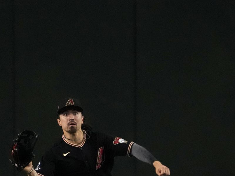 May 9, 2023; Phoenix, Arizona, USA; Arizona Diamondbacks left fielder Corbin Carroll (7) is unable to run down a line drive against the Miami Marlins during the fifth inning at Chase Field. Mandatory Credit: Joe Camporeale-USA TODAY Sports