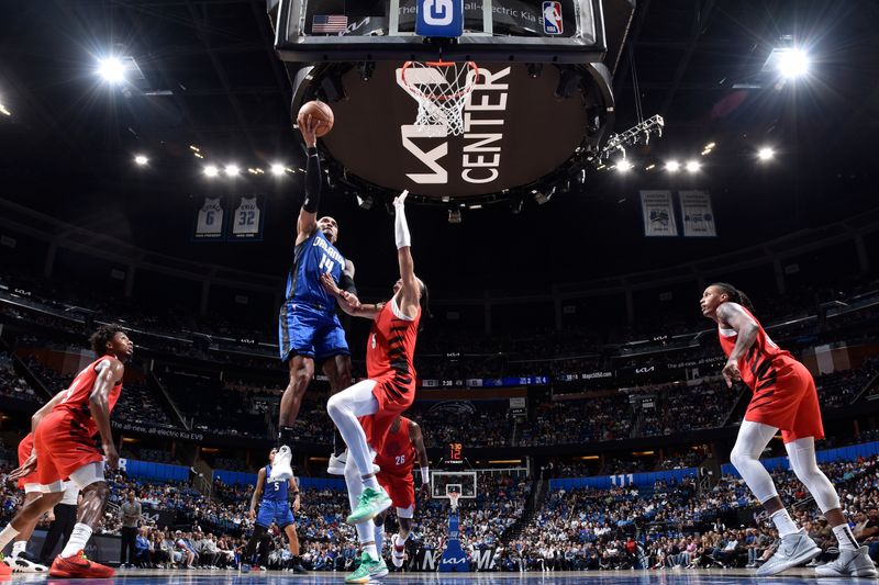 ORLANDO, FL - APRIL 1: Gary Harris #14 of the Orlando Magic drives to the basket during the game against the Portland Trail Blazers on April 1, 2024 at Kia Center in Orlando, Florida. NOTE TO USER: User expressly acknowledges and agrees that, by downloading and or using this photograph, User is consenting to the terms and conditions of the Getty Images License Agreement. Mandatory Copyright Notice: Copyright 2024 NBAE (Photo by Fernando Medina/NBAE via Getty Images)